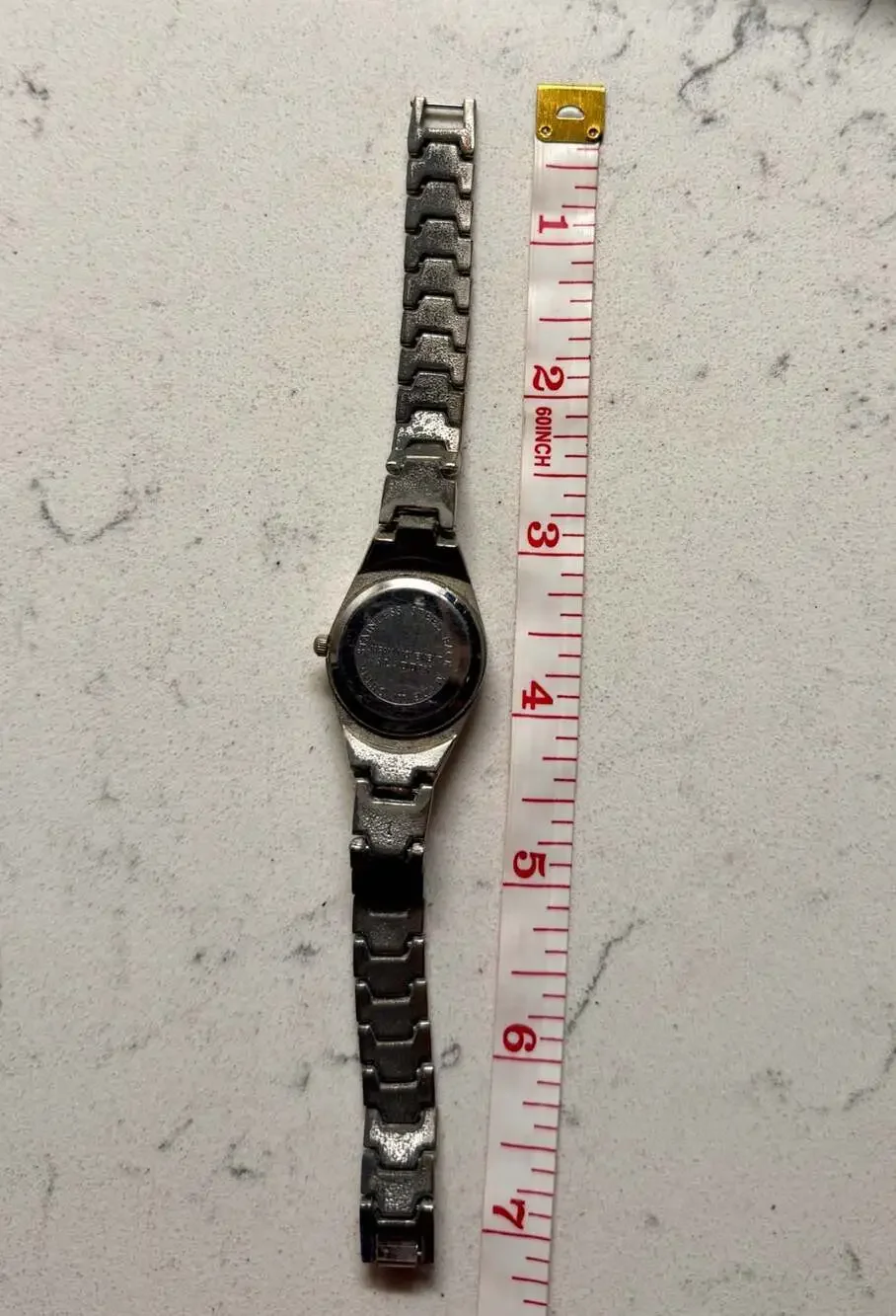 Aladdin Ladies Silver Tone Stainless Steel Analog Quartz Wristwatch